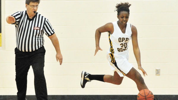Opp's Asia Edwards drives down the court during the area tournament. The Lady Bobcats will face Daleville at 6 p.m. on Thursday for the Class 3A South Regional Tournament semifinals. | Andrew Garner/Star-News
