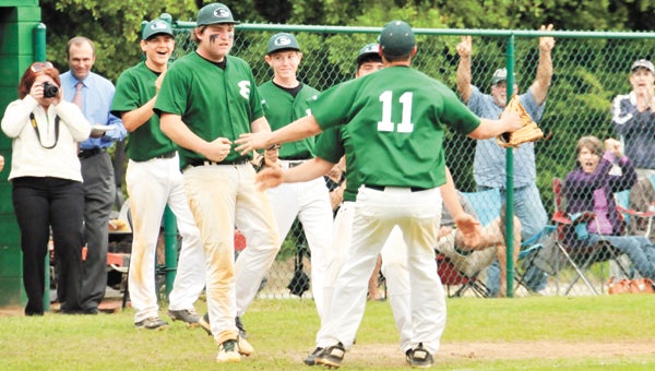 Florala players and parents celebrate the Wildcats' 8-4 win over Geneva County Monday. | Andrew Garner/Star-News