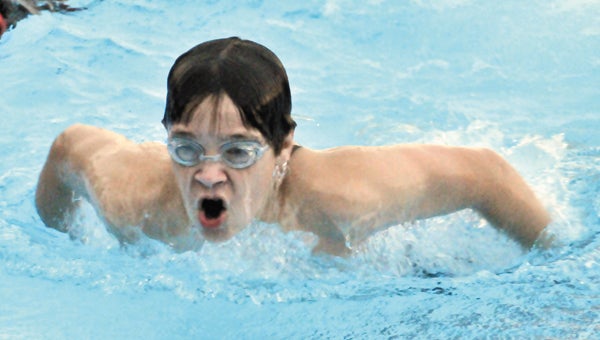 Brandon Hudson works on his butterfly stroke during Tuesday’s practice. | Andrew Garner/Star-News