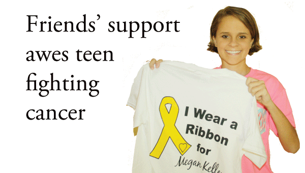 Megan Kelley holds the T-shirt designed by fellow AHS students that’s being sold to raise money to help with travel expenses.