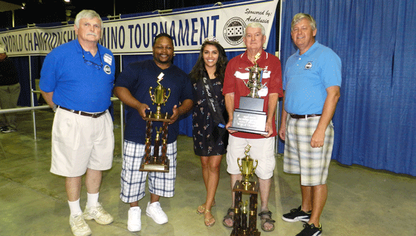 From left: Rotary president Wilbur Williams; Jerome Wooten, second place; Domino Queen Mary Beth Correro; Domino World Champion Billy Welch of Reeltown; and Rotarian David Darby.