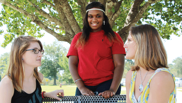 Enjoying a break between classes at LBW Community College are Emily Ricks of Andalusia, preparing for state board licensure in cosmetology and pursuing an associate in arts degree; Latrexius Trawick of Andalusia, a business major; and Kayla Higdon of Georgiana, who is studying to follow a long line of family members serving as paramedics.