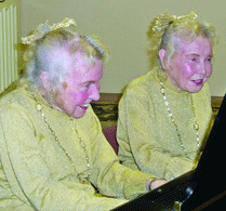 The Rainer twins – Alice and Clarice – provided dinner music at the annual Mizell gala.