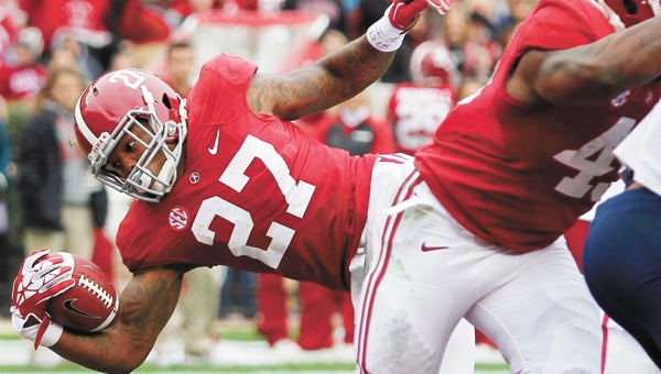 Alabama’s Derrick Henry reaches for a touchdown Saturday against Chattanooga.|       Alabama Athletics