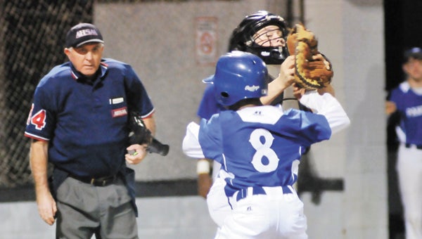 Red Level’s Colton Dorman tags Georgiana’s Detavious Likely (8) out at home plate Tuesday. | Andrew Garner/Star-News
