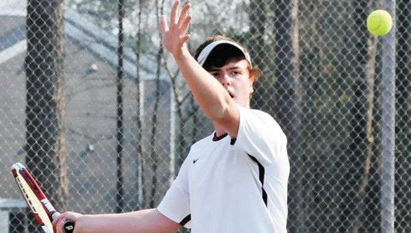 Andalusia’s Ari Carter focuses on making a forehand Monday. | Andrew Garner/Star-News