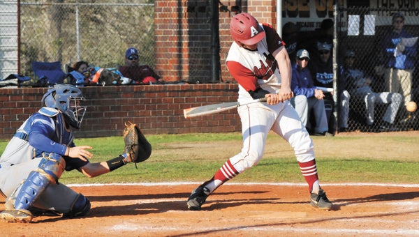 Andalusia's Justin Scherzinger connects during the Bulldogs' win over W.S. Neal Tuesday. | Andrew Garner/Star-News
