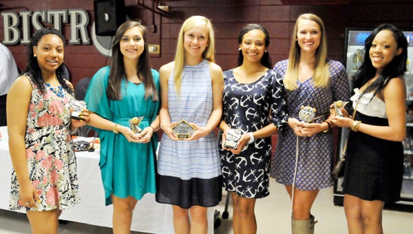 AHS cheerleaders from L to R: Ashleyn Payton, Lillian Andrews, Alli Yant, Haley Snider, Cassie Cooper and Sade Jackson pose for a picture with their awards Monday night. | Andrew Garner/Star-News