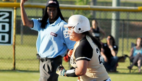 Straughn’s Kristen Peavy rounds second as infield umpire ... gives teh sign for a home run. | Andrew Garner/Star-News