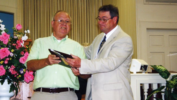 Pastor Larry Stewart is recognized for ten years of service at West Highland Baptist Church.