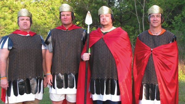 John Thomas, Todd Nichols, Darrin O'Neal, and Ernie Cleland portrayed Roman soldiers during Southside Baptist Church in Andalusia’s Cross Walk.  