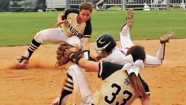 Straughn’s Carolina Fussell (top) tries to make a tag at second base as Molly Stewart (33) looks on Saturday. 