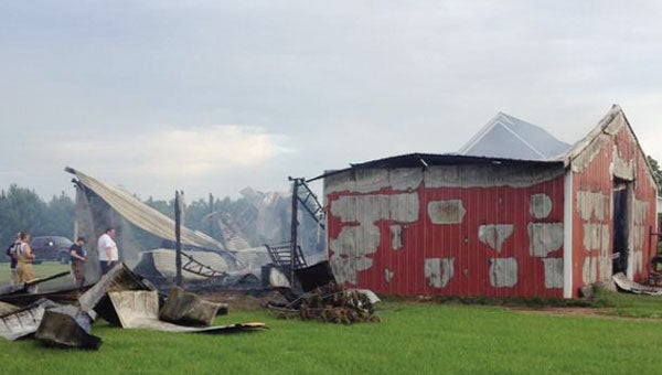 A barn located behind a home on Hattaway Road in Opp was completely destroyed by a fire that broke out early Saturday morning.