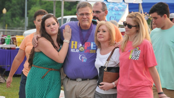 Cancer survivor Jay Farrington is shown with his wife, Beverly, and daugthers, Jennifer and Allison. | Andrew Garner/Star-News