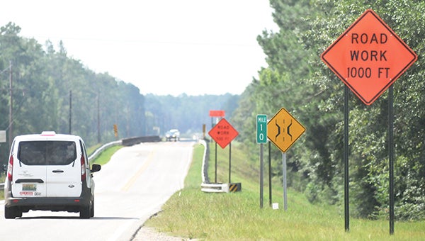 A commuter drives north on Highway 55 near the Yellow River Bridge on Wednesday afternoon. Road construction is set to begin today, starting at SR-15 in Andalusia. | Andrew Garner/Star-News 