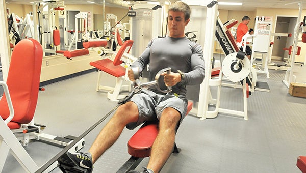 Zane Urbahns works out at USA Gym Thursday afternoon. |  Andrew Garner/ Star-News