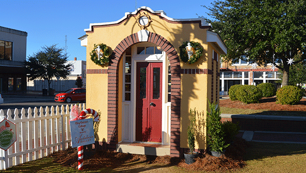 This tiny replica of Church Street School is a ballet studio, complete with music. Take a closer look at this and all of the other cottages of Candyland 2015. 