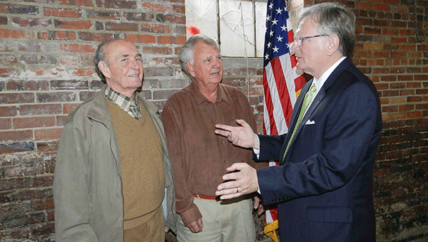 Mayor Earl Johnson, right, talks with Bill Hamiter and Lester O’Neal about plans for downtown. 