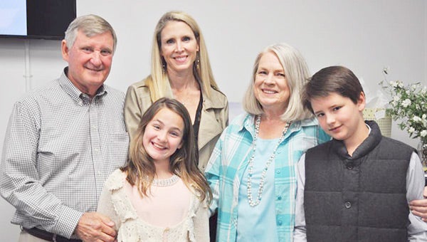 Retiring Andalusia attorneys Sonny and Linda James, along with their daughter, Christy, and grandchildren, Ellie and Matthew.  