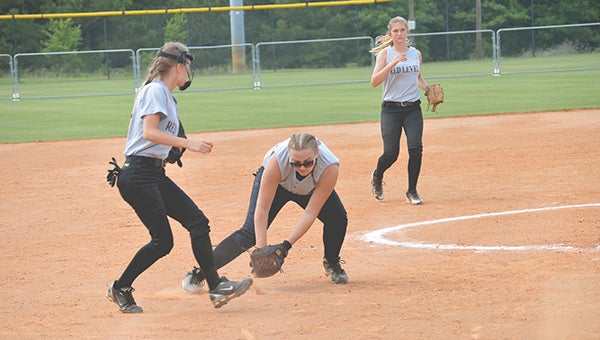 Hannah Colvin fields a ball hit back up the middle.