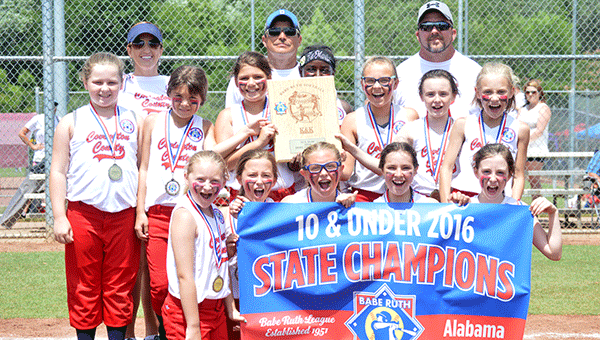 Covington County’s 10U softball All-Stars celebrate after defeating Wedowee 11-0 in Sunday’s state championship bout.