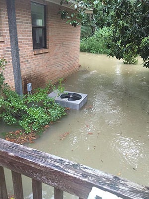 Shown is the home of Mrs. Stone in Opp near Burger King after Monday’s rains.                                Courtesy photo