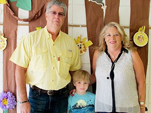 Chris and Donna Lawrence with their grandson, Chris, a second grader, at AES’s grandparents day yesterday. Courtesy photo
