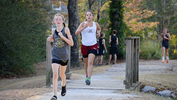 Straughn’s Spirit Hall and Andalusia’s Catherine Yanes pushed each other to strong finishes on Thursday.                                                                               Josh Dutton/Star-News