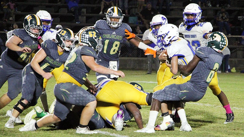 Wildcats fall behind early, battle back for region victory, 24-14