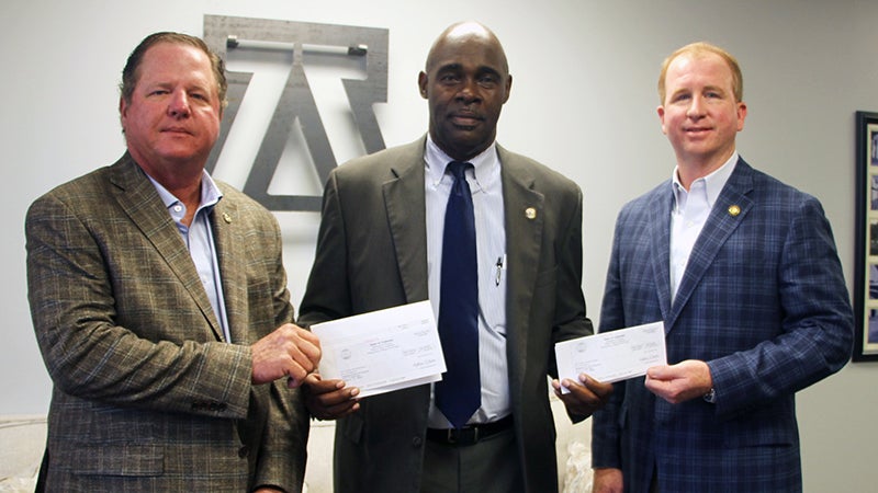 Carnley, Hammett present grant funds to county’s school systems